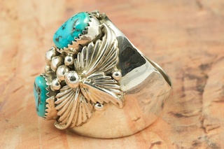 Genuine Sleeping Beauty Turquoise set in Heavy Gauge Sterling Silver. The Sleeping Beauty Turquoise mine is located in Gila County, Arizona. Created by Navajo Artist Freddy Charley. Signed. 
